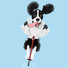 Black Springer Spaniel jumping on a pogo stick